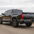 Load image into Gallery viewer, MagnaFlow 22+ Toyota Tundra Street Series 3in Dual Driver Side Rear Cat-Back Exhaust - Side View
