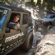 Load image into Gallery viewer, MagnaFlow 12-18 Jeep Wrangler 2.5in Overland Series Cat-Back Exhaust - Installation View