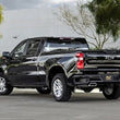 Load image into Gallery viewer, MagnaFlow 19-23 GM 1500 4.3L / 5.3L D-Fit Muffler Replacement - Side View