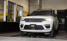 Load image into Gallery viewer, MagnaFlow NEO Series Cat-Back Exhaust fits 2022-2025 Jeep Grand Cherokee - Installation View