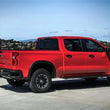 Load image into Gallery viewer, MagnaFlow 19-23 Chevy Silverado 1500 19-23 GMC Sierra 1500 Overland Cat-Back Exhaust - Side View
