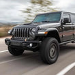 Load image into Gallery viewer, MagnaFlow 21-22 Jeep Wrangler V8 6.4L Street Series Cat-Back Exhaust w/ Black Tips - Installation View