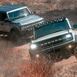 Load image into Gallery viewer, Magnaflow 21-22 Ford Bronco L4 2.3L Overland Series Cat-Back Exhaust - Side View