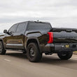Load image into Gallery viewer, MagnaFlow 22+ Toyota Tundra Street Series 3in Dual Driver Side Rear Cat-Back Exhaust - Side View