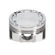 Load image into Gallery viewer, Manley 08+ Mitsubishi 4B11T 86mm STD -11cc Dome 9.0:1 CR Turbo Tuff Series Piston Set w/ Rings - Installation View