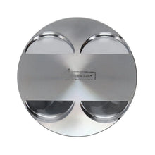 Load image into Gallery viewer, Manley 16+ Nissan VR30DDTT 86mm Bore Grade 2 10:1 CR -3.5cc Dome Flat Top Piston w/ Rings (SINGLE) - Installation View