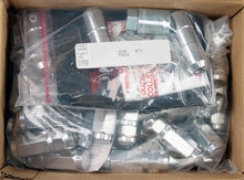 Load image into Gallery viewer, McGard 8 Lug Hex Install Kit w/Locks (Cone Seat Nut / Duplex) 9/16-18 / 7/8 Hex / 2.5in L - Chrome - Installation View