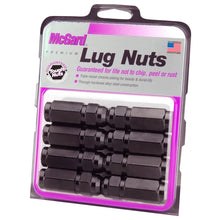 Load image into Gallery viewer, McGard Hex Lug Nut (Cone Seat / Duplex) 9/16-18 / 7/8 Hex / 2.5in. Length (8-Pack) - Black - Installation View