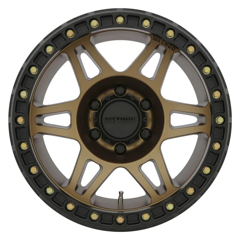 Method MR106 Beadlock 17x9 -44mm Offset 6x5.5 108mm CB Method Bronze w/BH-H24125 Wheel - Side View