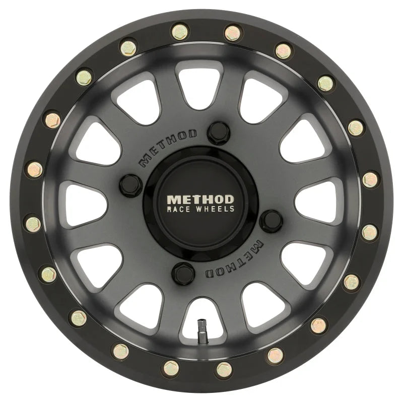 Method MR401 UTV Beadlock 15x7 / 4+3/13mm Offset / 4x136 / 106mm CB Titanium Wheel- Matte Black Ring - Side View