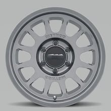 Load image into Gallery viewer, Method MR703 17x7.5 +50mm Offset 6x130 84.1mm CB Gloss Titanium Wheel - Side View