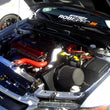 Load image into Gallery viewer, Mishimoto 03-07 Mitsubishi Lancer Evo Manual Aluminum Radiator - Side View