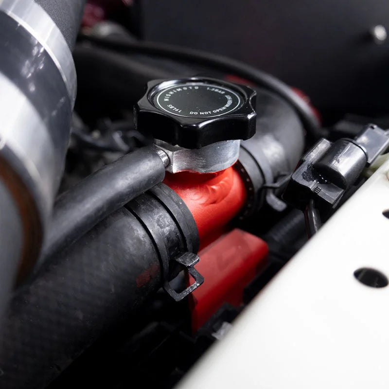 Mishimoto 08-15 Mitsubishi Lancer Evo X Coolant Fill Inlet - Black - Back View