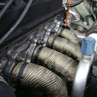 Load image into Gallery viewer, Mishimoto 2 inch x 35 feet Heat Wrap with Stainless Locking Tie Set - Installation View