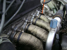 Load image into Gallery viewer, Mishimoto 2 inch x 35 feet Heat Wrap with Stainless Locking Tie Set - Installation View