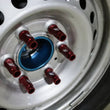 Load image into Gallery viewer, Mishimoto Aluminum Locking Lug Nuts M12x1.5 27pc Set Red - Installation View