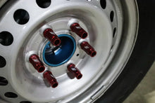 Load image into Gallery viewer, Mishimoto Aluminum Locking Lug Nuts M12x1.5 27pc Set Red - Installation View