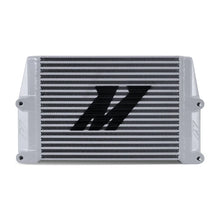 Load image into Gallery viewer, Mishimoto Heavy-Duty Oil Cooler - 10in. Same-Side Outlets - Silver - Installation View
