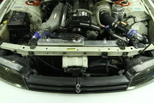 Load image into Gallery viewer, Mishimoto R33/R34 Nissan Skyline (NON R34 GTR) Manual Aluminum Radiator - Back View