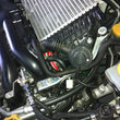 Load image into Gallery viewer, Mishimoto Subaru WRX Blue Silicone Throttle Body Hose - Installation View