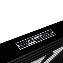 Load image into Gallery viewer, Mishimoto Universal Black R Line Intercooler Overall Size: 31x12x4 Core Size: 24x12x4 Inlet / Outlet - Installation View