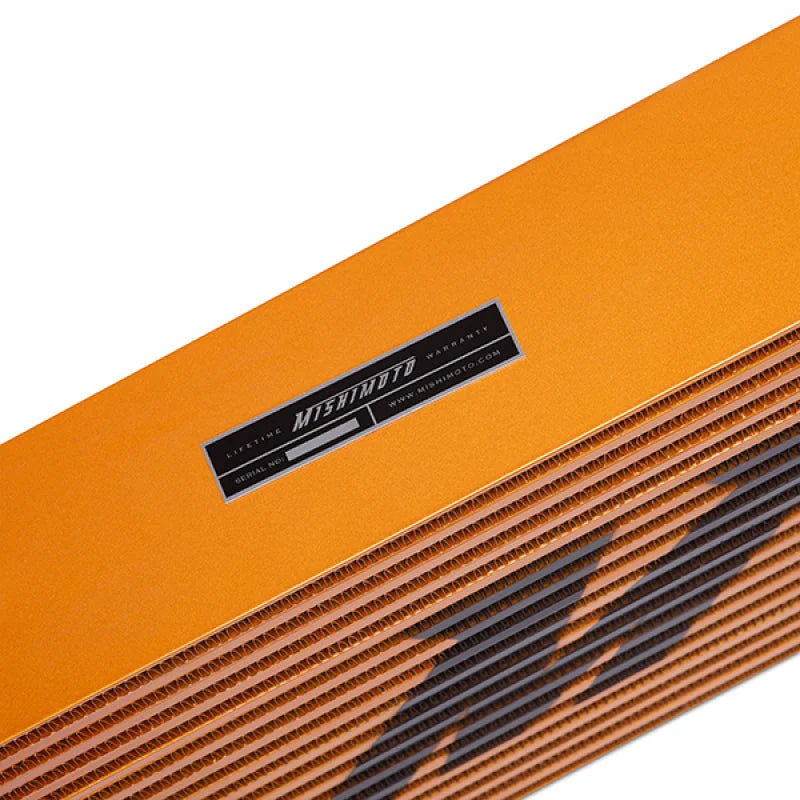 Mishimoto Universal Gold R Line Intercooler Overall Size: 31x12x4 Core Size: 24x12x4 Inlet / Outlet - Back View