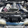Load image into Gallery viewer, Mishimoto Universal Silver R Line Intercooler Overall Size: 31x12x4 Core Size: 24x12x4 Inlet / Outle - Back View