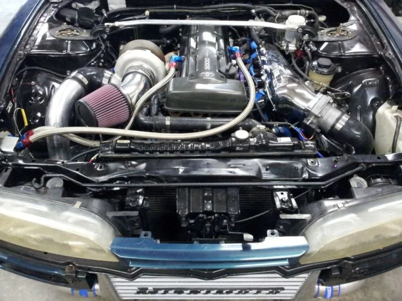 Mishimoto Universal Silver R Line Intercooler Overall Size: 31x12x4 Core Size: 24x12x4 Inlet / Outle - Back View