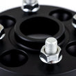 Load image into Gallery viewer, Mishimoto Wheel Spacers - 4x100 - 56.1 - 15 - M12 - Black - Installation View