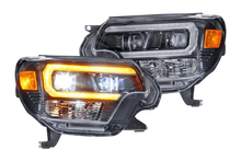 Load image into Gallery viewer, Morimoto MM XB HYBRID HEADS: TACOMA(12-15)(AMBER) LF529-A