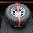 Load image into Gallery viewer, N-Fab Bed Mounted Rapid Tire Strap Universal - Gloss Black - Red Strap - Side View