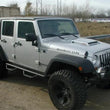 Load image into Gallery viewer, N-Fab Nerf Step 07-17 Jeep Wrangler JK 4 Door All - Tex. Black - W2W - 3in - Back View