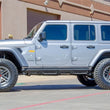 Load image into Gallery viewer, N-Fab Predator Pro Step System 2018 Jeep Wrangler JL 4 Door SUV - Tex. Black - Installation View