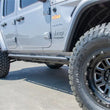 Load image into Gallery viewer, N-Fab RKR Rails 2019 Jeep Wrangler JT 4DR Truck Full Length - Tex. Black - 1.75in - Additional View 5
