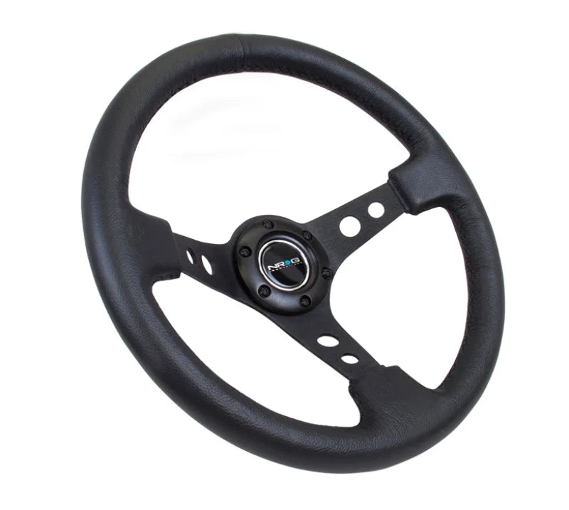NRG Reinforced Steering Wheel (350mm / 3in. Deep) Blk Leather w/Blk Spoke & Circle Cutouts - Main Product View