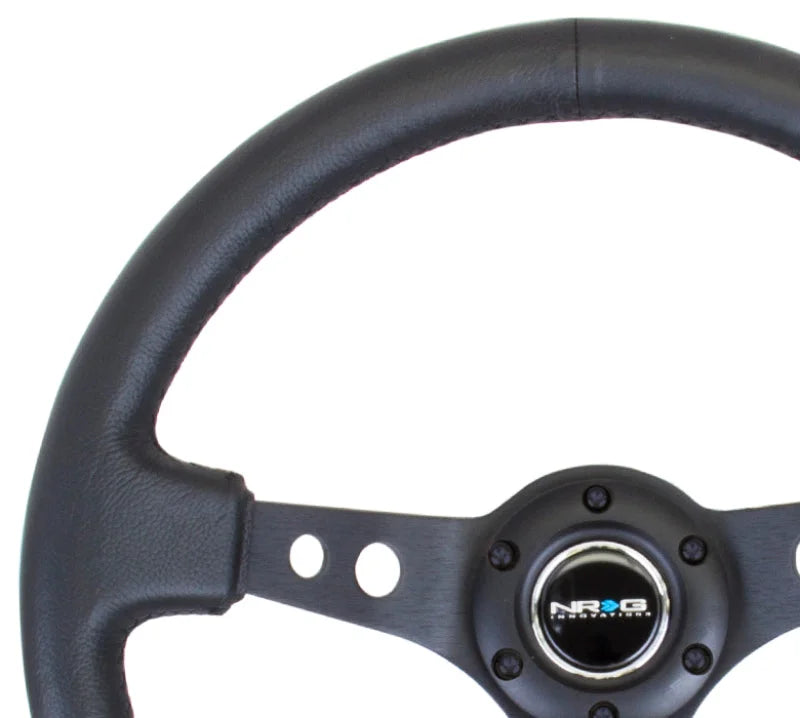 NRG Reinforced Steering Wheel (350mm / 3in. Deep) Blk Leather w/Blk Spoke & Circle Cutouts - Side View