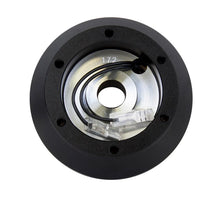 Load image into Gallery viewer, NRG Short Hub Adapter 1969-1973 Ford Mustang - Installation View