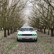 Load image into Gallery viewer, ORACLE Lighting LED Projector Headlight Halo Kit - Green fits 2008-2014 Dodge Challenger - Side View