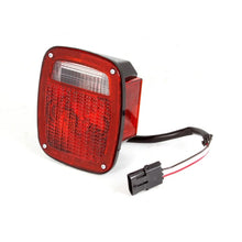Load image into Gallery viewer, Omix Right Black Tail Lamp 91-97 YJ TJ Wrangler