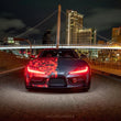 Load image into Gallery viewer, Oracle 20-21 Toyota Supra GR RGB+A Headlight DRL Upgrade Kit - ColorSHIFT 2 - Side View