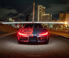 Load image into Gallery viewer, Oracle 20-21 Toyota Supra GR RGB+A Headlight DRL Upgrade Kit - ColorSHIFT - Side View