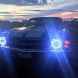 Load image into Gallery viewer, Oracle Pre-Installed Lights 7 IN. Sealed Beam - White Halo - Side View