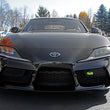 Load image into Gallery viewer, PERRIN 20-25 Toyota Supra Tow Hook Kit (Front) - Neon Yellow - Back View