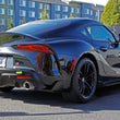 Load image into Gallery viewer, PERRIN 20-25 Toyota Supra Tow Hook Kit (Rear) - Neon Yellow - Back View