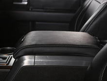 Load image into Gallery viewer, PRP 10-14 Ford Raptor  Center Console Cover- Black with Silver Stitch - Installation View