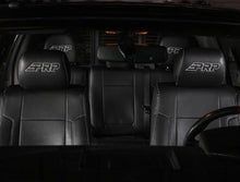 Load image into Gallery viewer, PRP 12-14 Ford Raptor Front Seat Covers (Pair) - Black w Silver Stitch - Installation View