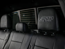 Load image into Gallery viewer, PRP 12-14 Ford Raptor  Rear Bench Seat Covers- Black with Silver Stitch - Installation View