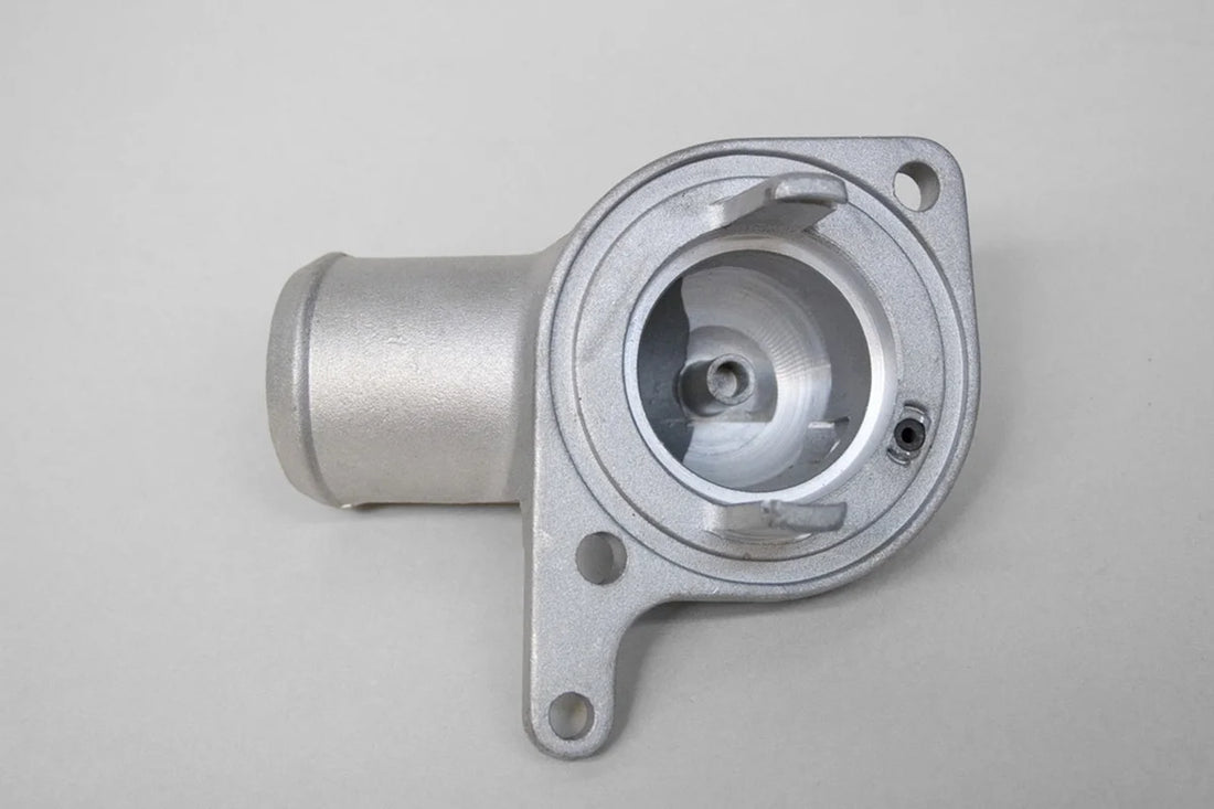 PRW Water Pump Neck Outlet; Cast Aluminum; 90 Degree; As-Cast. 5234681 - Side View