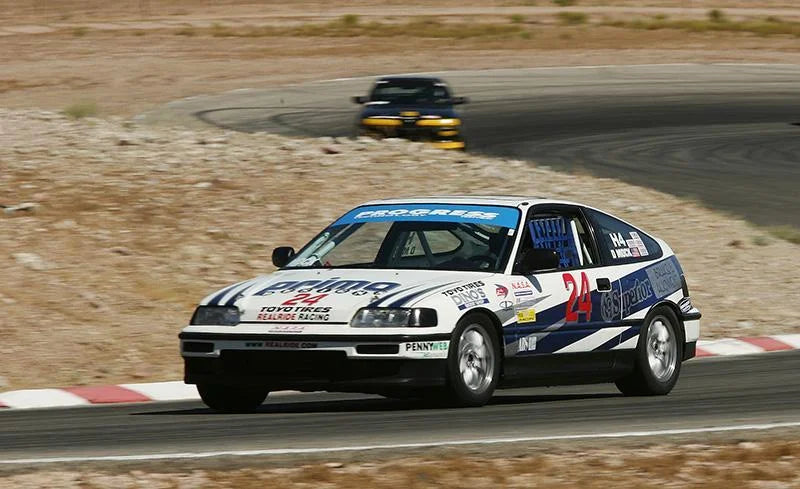 Progress Tech 89-91 Honda Civic/Si/CRX Coil-Over 2 System (FR 350lb / RR 550lb) Factory Top Hat Only - Side View