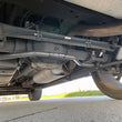 Load image into Gallery viewer, Progress Tech LT 01-20 Chevrolet Tahoe/Suburban / GMC Yukon Rear Sway Bar (30mm) - Gray - Installation View